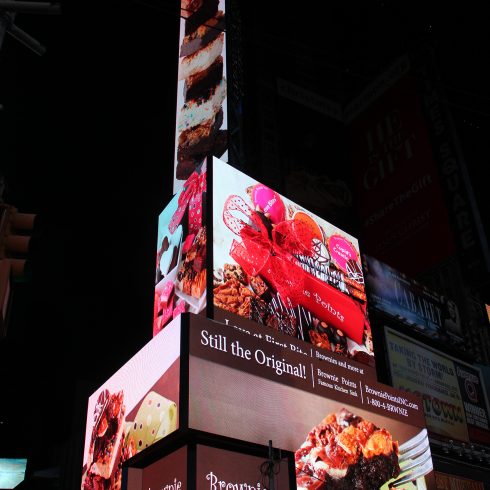 Advertising Photographer Curtis Wallis work showcased in Times Square for American Eagle and Brownie Points.